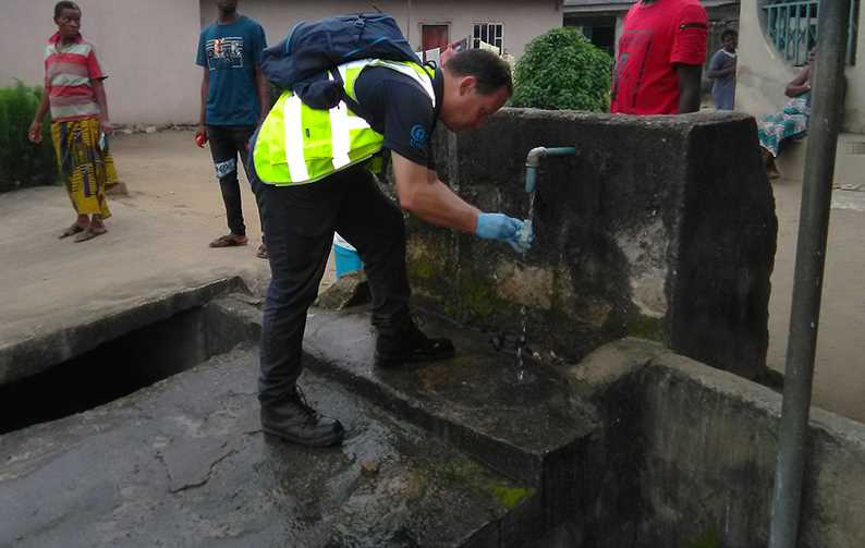 ALS PFAS lead, Geraint Williams, collecting samples to assess risk to the water environment.