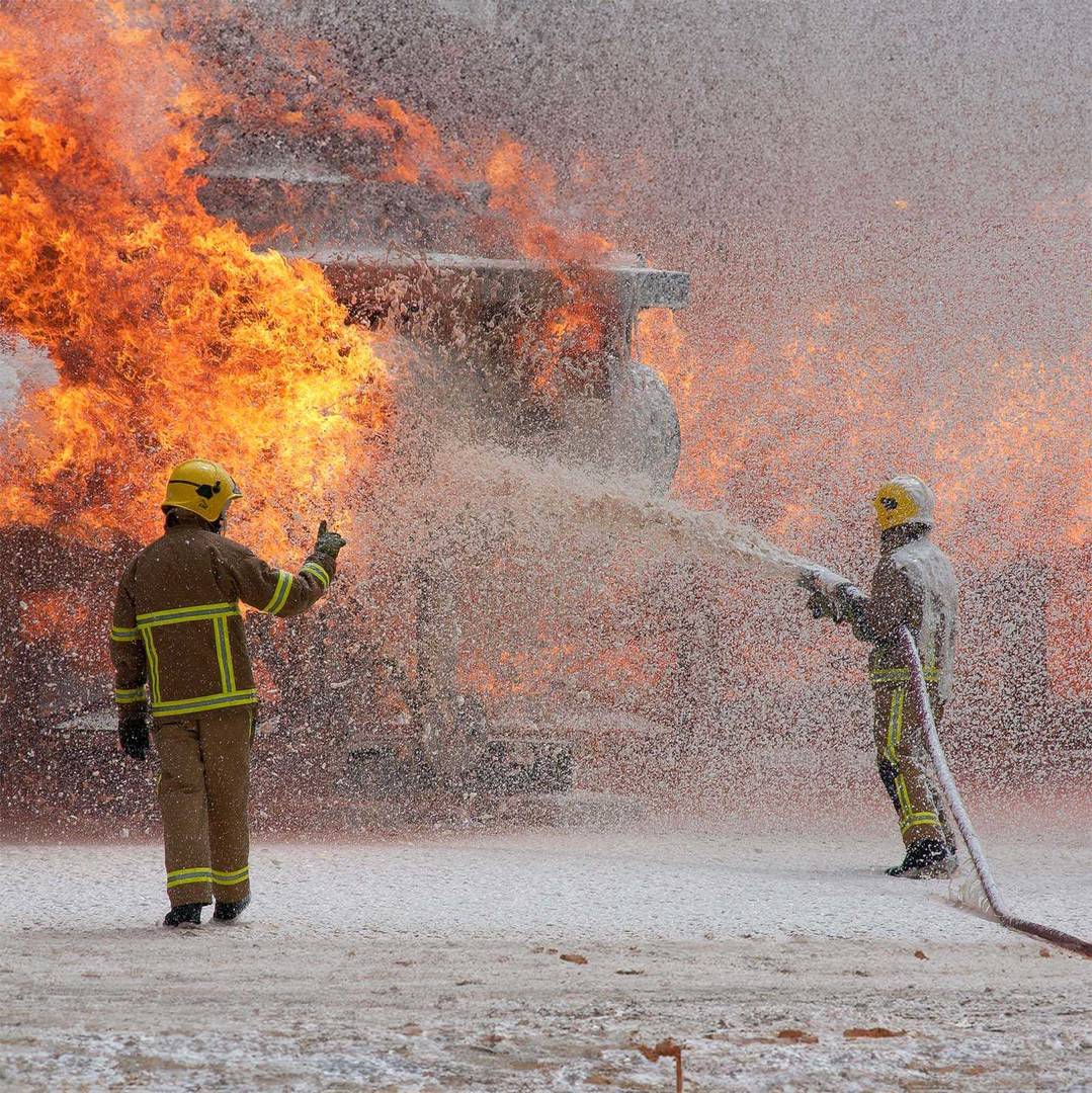 firefighters at an airport